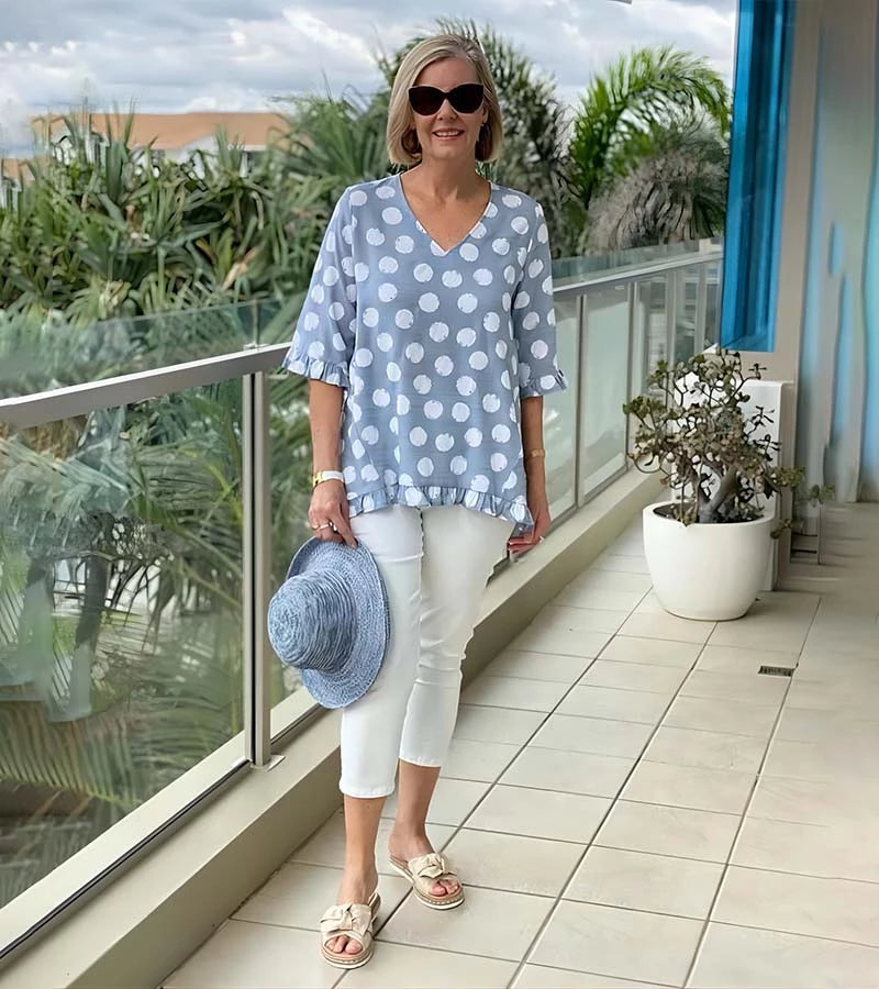 Brunella | Blusa alla moda a pois con volant