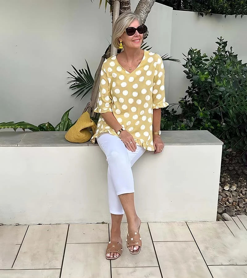 Brunella | Blusa alla moda a pois con volant