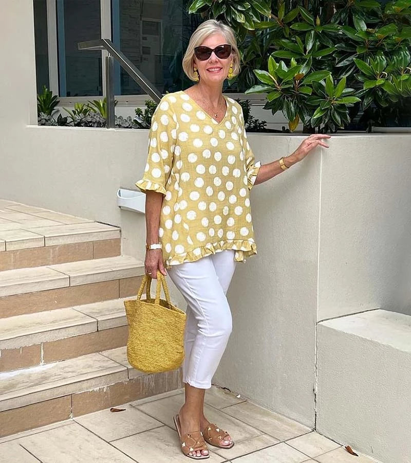Brunella | Blusa alla moda a pois con volant