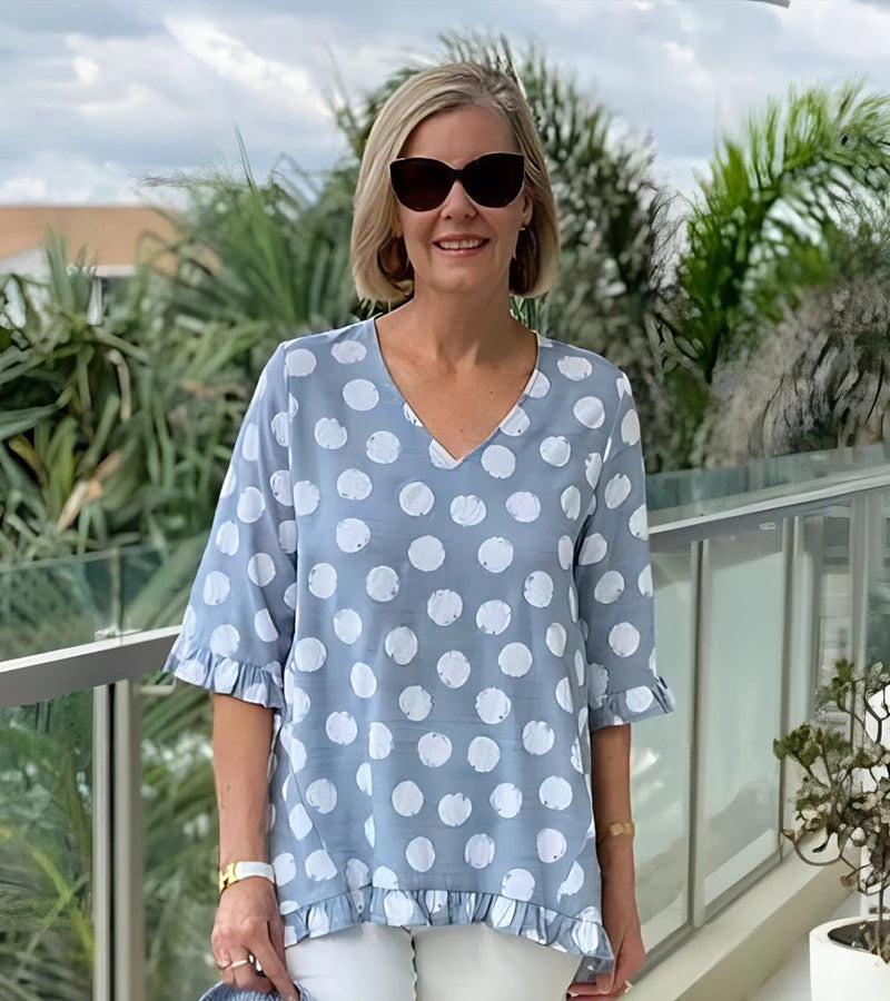 Brunella | Blusa alla moda a pois con volant